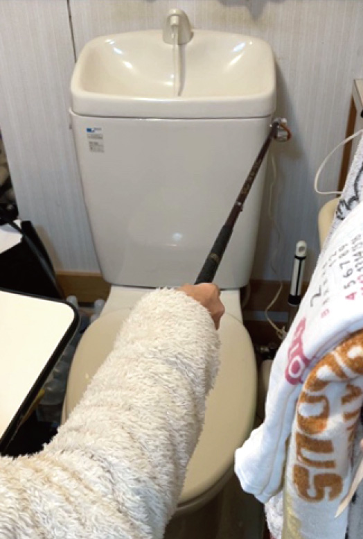 ループをレバーへかける